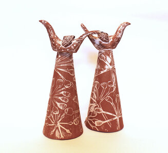 candle holders with birds