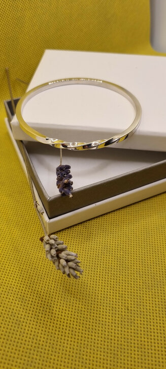 Silver part twist bangle