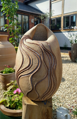 Large carved vessel