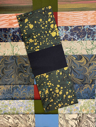 Hand-marbled cases, ready for binding
