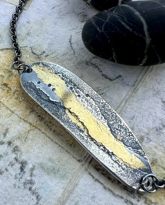 Strandline bracelet. Silver and 24ct gold. North collection